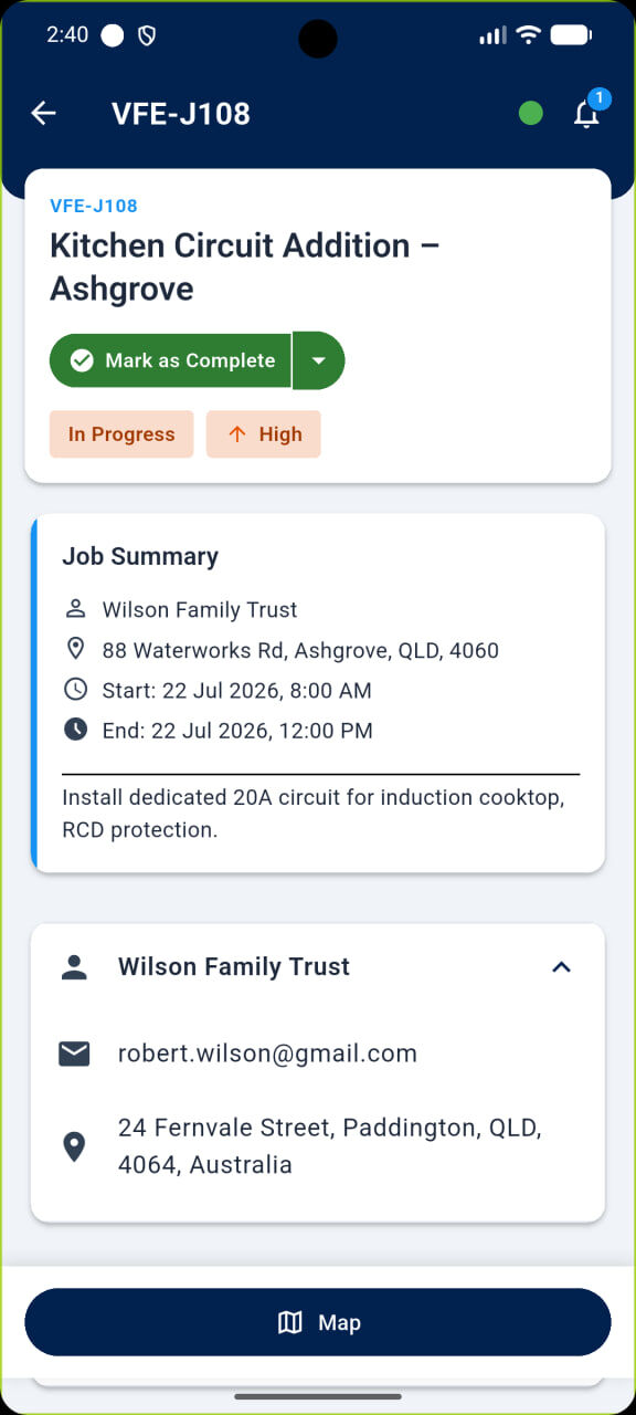 Job detail screen for a kitchen circuit addition with a one-tap Mark as Complete button and customer contact details